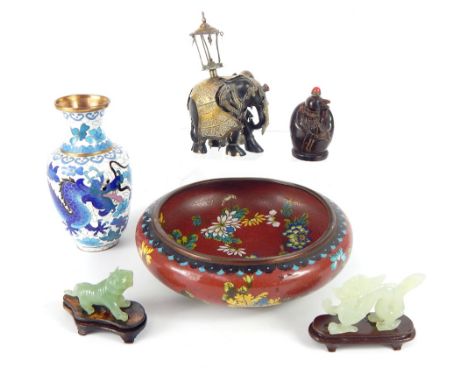 A cloisonné vase and bowl, a carved jade tiger and dragon, a carved horn snuff bottle and a carved ebony Indian elephant clad