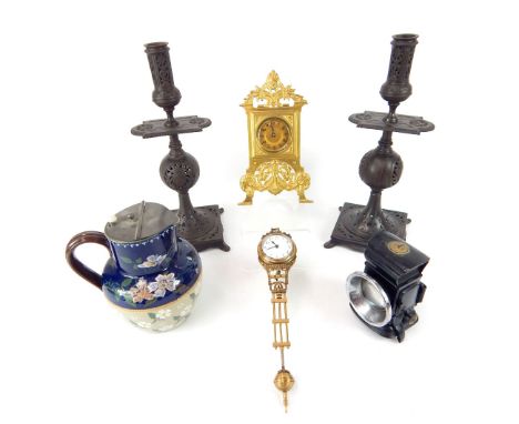 French brass strut clock, mask and foliate surmount, with swags and rams heads to legs, British clock Co movement, circa 1900