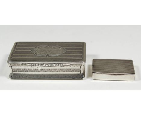 A Victorian silver rectangular snuff box with engine turned ornament and floral cast thumbpiece, 2.875ins x 1.75ins x .5ins h