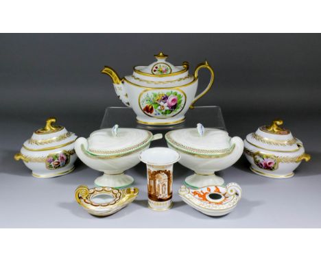 A pair of early 19th Century English creamware pottery sauce tureens and covers of "Nautilus Shell" shape, painted with green