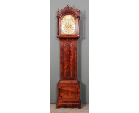 An 18th Century mahogany longcase clock by Robert Evens of Halsted, the 12ins arched brass dial with wide silvered chapter ri