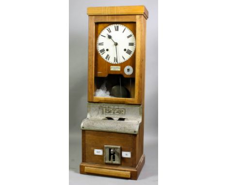 A mid 20th Century "Clocking-In" clock by The British Time Recorder Co. Ltd, London, in oak and painted cast metal case, 13in