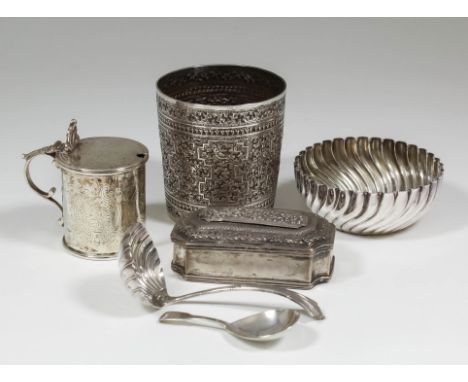 A Victorian silver cylindrical mustard pot, the flat lid with pierced anthemion pattern thumbpiece and the whole engraved wit