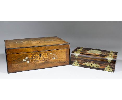 A late 19th Century brass bound coromandel games box, the interior with cribbage board and playing card, 11.5ins wide x 7ins 