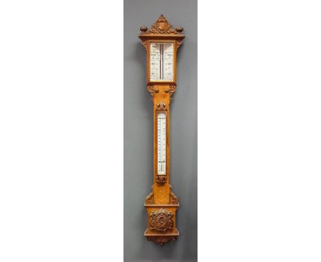 A late Victorian oak cased stick barometer and thermometer by Ross of London with engraved ivory scales contained in case car