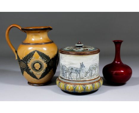 A Doulton Lambeth stoneware biscuit barrel with incised decoration of deer in a landscape, by Hannah Barlow, 5.5ins diameter 