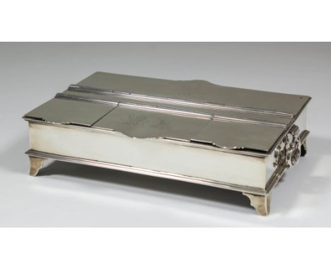 A late Victorian plain silver rectangular two-handled enclosed inkstand of early 18th Century design, the flat top with four 