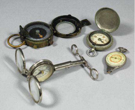 A British First World War brass cased compass with sighting piece and cover, 2.25ins diameter (dated 1917, No. 195732 and wit