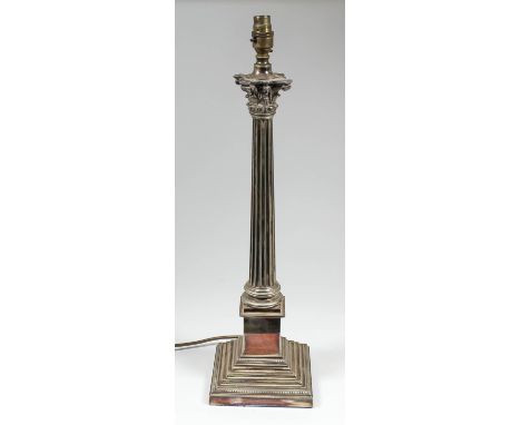 A 20th Century silver plated electric table lamp base of Corinthian column, on square stepped base, 21.5ins high 