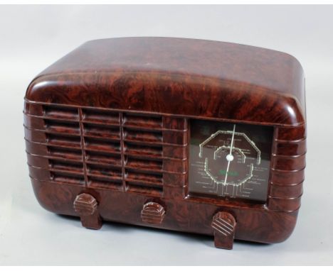 A 1930s Strad mains operated valve radio in brown mottled Bakelite casing of Art Deco design, 15.5ins wide x 7.5ins deep x 10