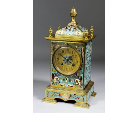 A late 19th Century French gilt brass and champleve enamel cased mantel clock, No. 30063, retailed by Taroni, 134 High Street
