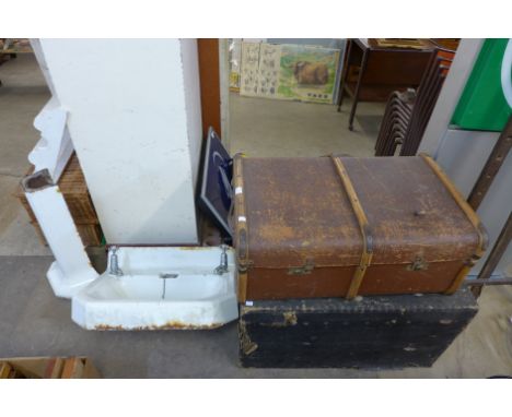 A blanket chest, banded steamer trunk and white metal sink