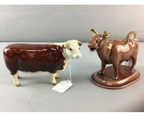 BESWICK CH OF CHAMPIONS MODEL, along with a ceramic cow creamer (2)