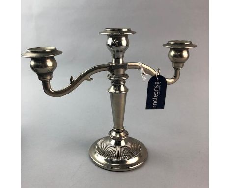 SILVER PLATED CANDELABRA, along with a similarly decorated dwarf candlestick, silver napkin ring, a pair of silver plated dwa