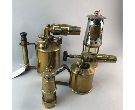 THE PROTECTORS MIINERS LAMP, 25.5cm high, along with a smaller miners lamp inscribed 'Sir Humphry Davy' and two soldering lam