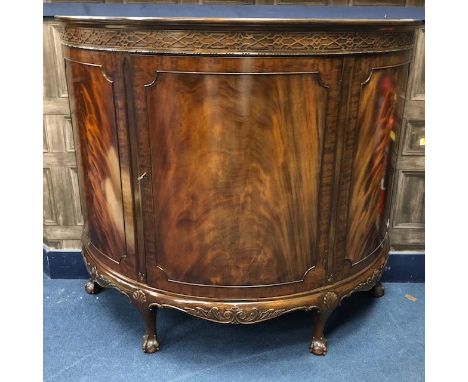 MAHOGANY DEMI LUNE LOUNGE COMMODE CABINET, on ball and claw feet, 106cm high