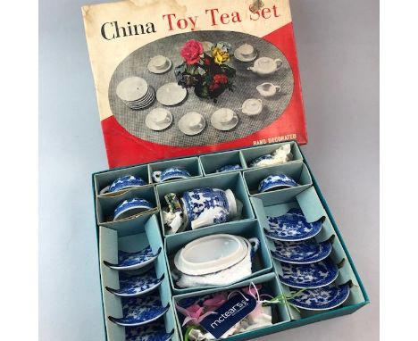 CHILD'S CHINA TEA SERVICE, in a blue and white willow type pattern, boxed