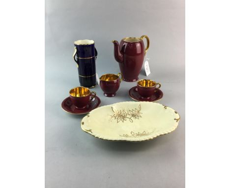 CROWN DEVON COFFEE SERVICE, comprising coffee pot, six cups, six saucers, sugar and cream, in red with gilt highlights, along