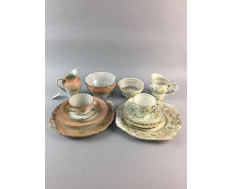 PARAGON FLORAL AND GILT DECORATED TEA SERVICE, comprising six trios, cream, sugar and sandwich plate, along with a pink and f