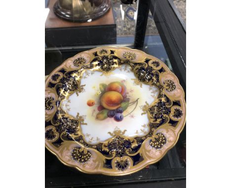 PAIR OF ROYAL WORCESTER PLATES, hand painted with fruit and berries by A Shuck with a gilt scrolling and jewelled border