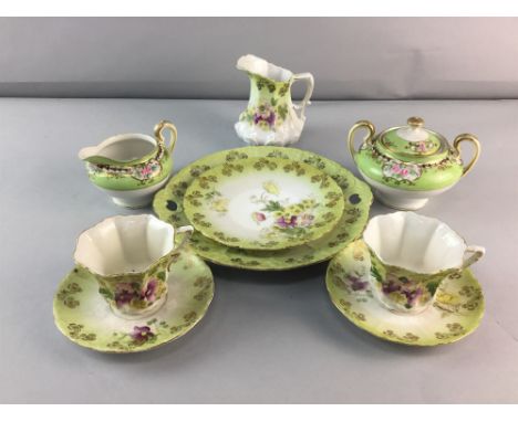 EDWARDIAN PART TEA SERVICE, comprising 12 saucers, 12 cups, sugar and cream