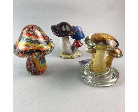 GLASS MODEL OF A TOADSTOOL, with coloured glass inclusions, along with a glass model of mushrooms and a ceramic model of two 
