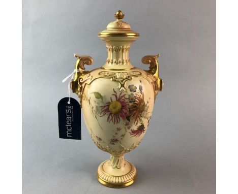 ROYAL WORCESTER BALUSTER TWIN HANDLED VASE AND COVER, decorated with floral sprays, on a blush ivory ground, 27cm high