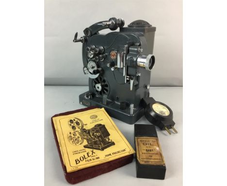 PAILLARD-BOLEX CINE-AUTO PROJECTOR WITH TRIPOD STAND, along with related equipment, including a Popular film splicer, Mazda p