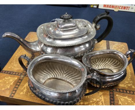 SILVER PLATED THREE PIECE TEA SERVICE, along with a cased pair of salt dishes and brass candlesticks