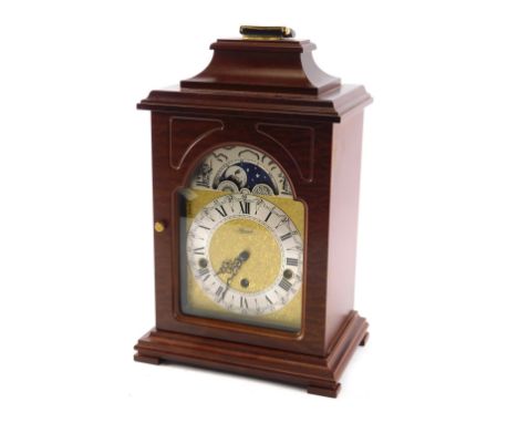 A Hermle mantel clock, with moon phase, Westminster chime, in mahogany case, 35cm high. 