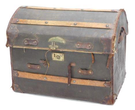A late 19th/early 20thC canvas and leather domed top trunk, with wooden slats, 78cm wide. 