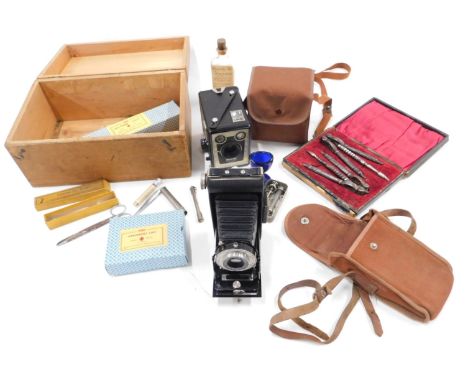 Miscellaneous items, to include first day pieces, two cameras, and a lobster pick set. 
