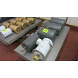 [Lot] (5) Motors, (2) 15 hp, (3) 7.5 hp (contents on cart, no cart)