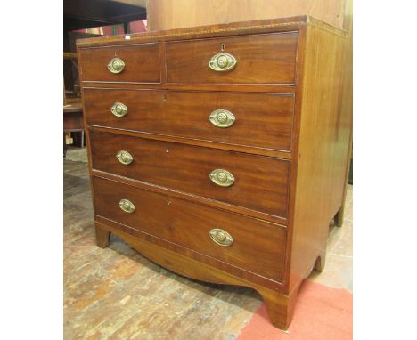 A Georgian mahogany chest of three long and two short drawers, the caddy top with chequered string inlay detail, the handles 