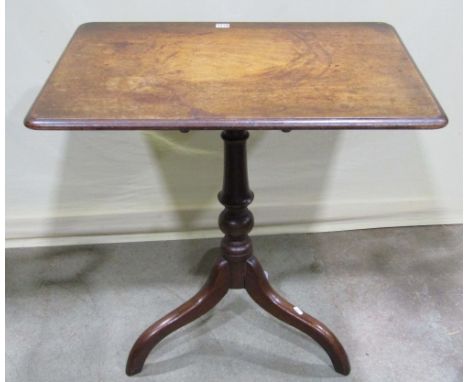 A 19th century mahogany snaptop occasional table of rectangular form, with moulded outline raised on a turned pillar and shap