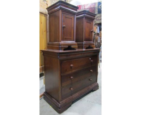 A Willis &amp; Gambier reproduction cherrywood commode of three long drawers, together with a pair of matching bedside cupboa