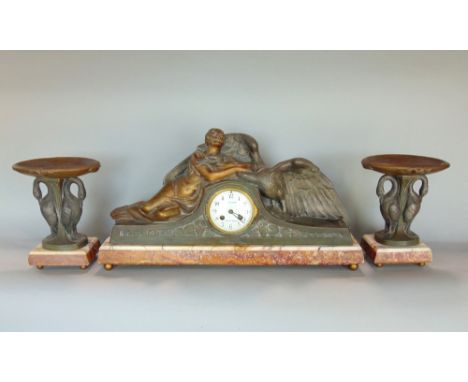An art deco clock garniture Leda &amp; Swan garniture with an eight day striking movement, raised on a marble plinth, flanked