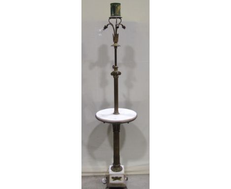 A good quality cast gilt metal telescopic standard lamp in the form of a reeded classical column with doric capital, circular