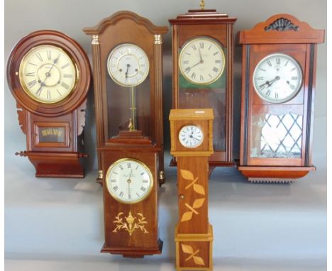 A collection of five various drop dial wall clocks to include Knight &amp; Gibbons examples, together with a miniature longca