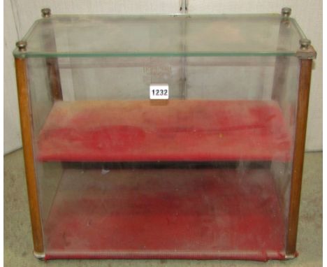 A vintage 'Displayall' PAT number 463733, small counter top shop display cabinet with glazed surround and tapered front and s