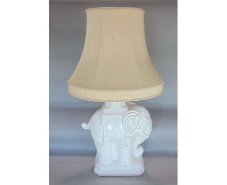 Italian Blanc de Chine porcelain elephant converted into a lamp, upon a stepped square base, potters mark stamped to base, th
