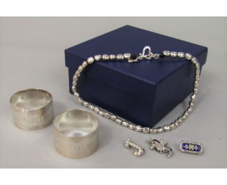 Boxed Dower &amp; Hall sterling silver bead necklace, together with two engine turned silver napkin rings, a French enamelled