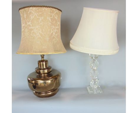 A prism cut glass table lamp, together with a copper lustre ceramic table lamp of circular form