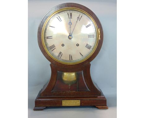 Early 20th century two train mahogany balloon head mantel clock, the silver dial with engraved Roman numerals, striking on a 