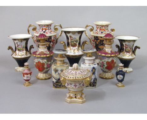 A collection of 19th century decorative ceramics including a garniture of three blue ground two handled vases with painted ca