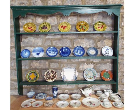 A collection of Royal Copenhagen tea wares with floral detail comprising teapot, milk jug, sugar bowl, five cups, seven sauce