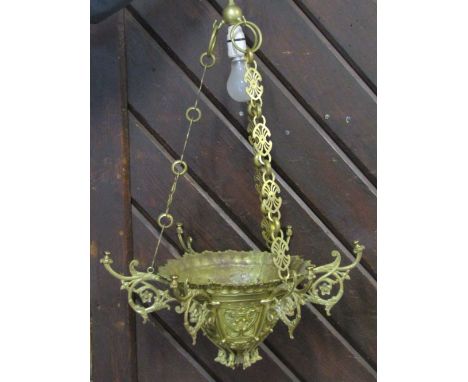 A cast brass chain-link hung ceiling light with scrolling foliate detail