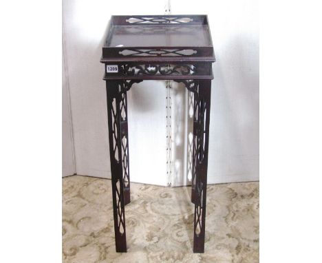 A Chippendale revival urn or occasional table of square cut form, with pierced fretwork detail