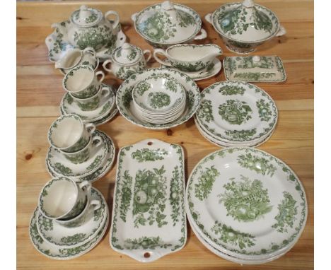 A collection of Masons Fruit Basket pattern wares in a green colourway, comprising a pair of tureens and covers, sauce boat a