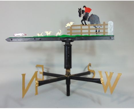Weather vane with sporting interest, mounted by pierced decoration of a hunting scene with a hunter on horseback with hounds 